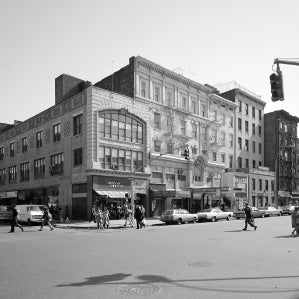 Veselka in the 1960's , black and white zoomed out so its across the street with pedestrians milling around.