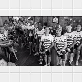 Black and white image of the Veselka cycling team when it first launched