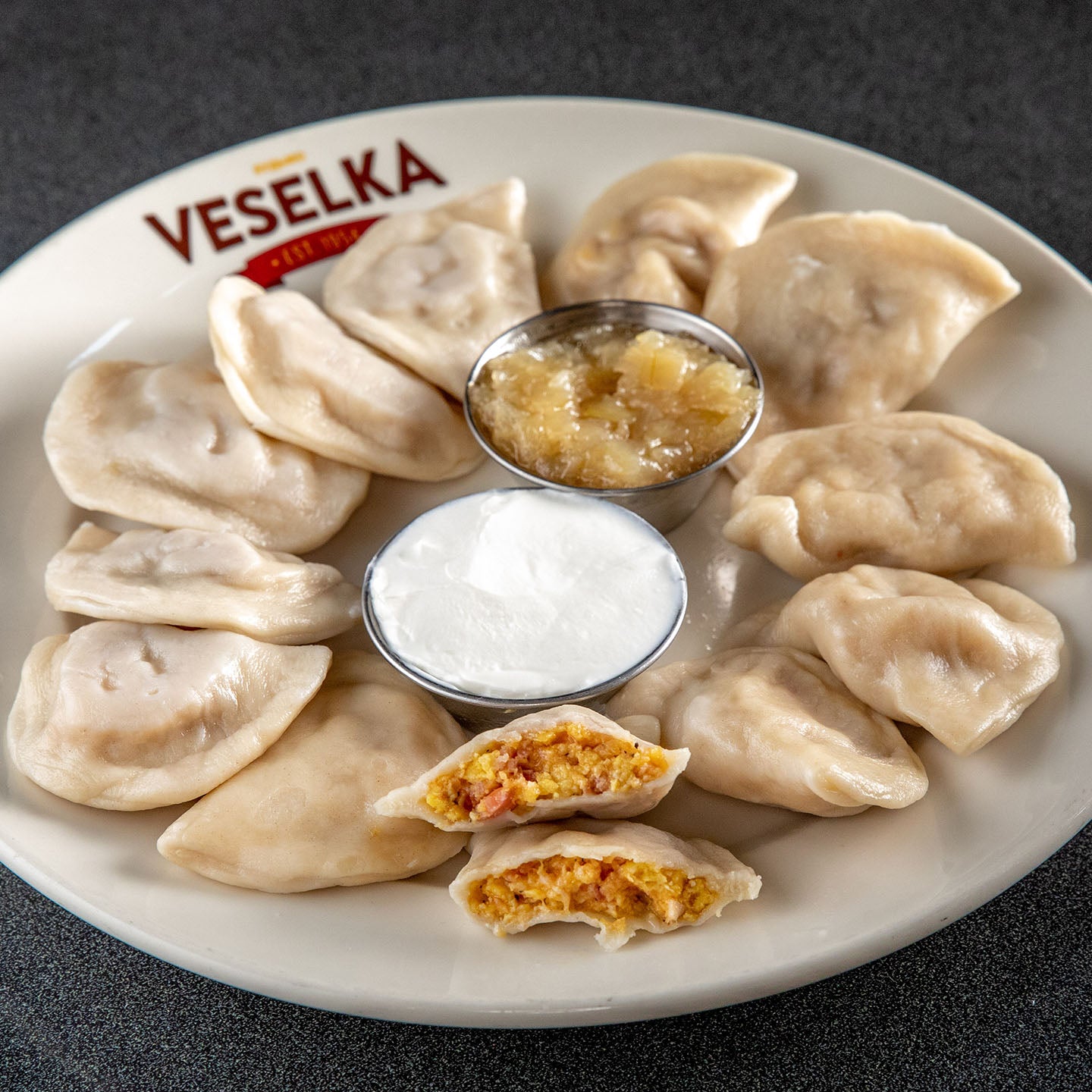 Bacon Egg and Cheese pierogi, boiled on a plate 